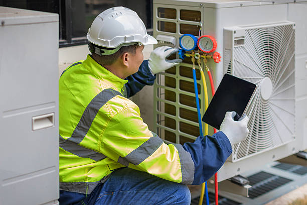 Professional Hvac technician working in Dewey, OK